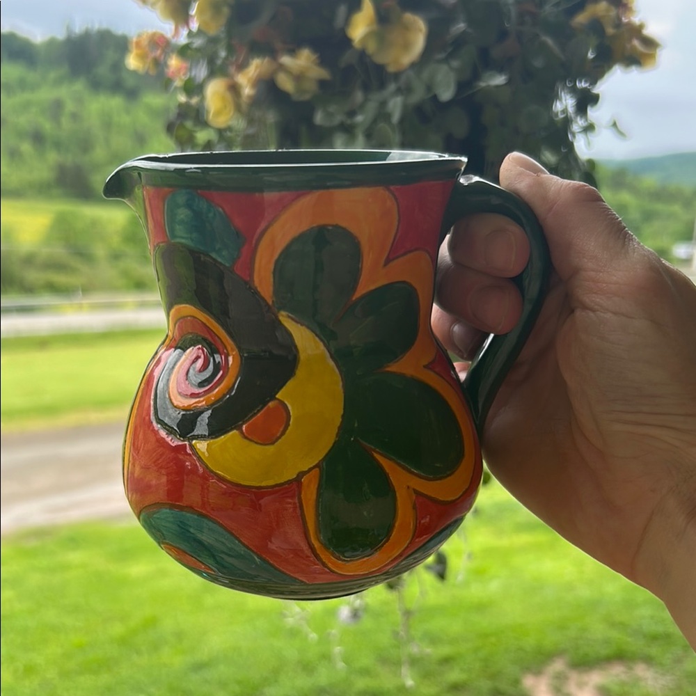 Unique floral pottery pitcher